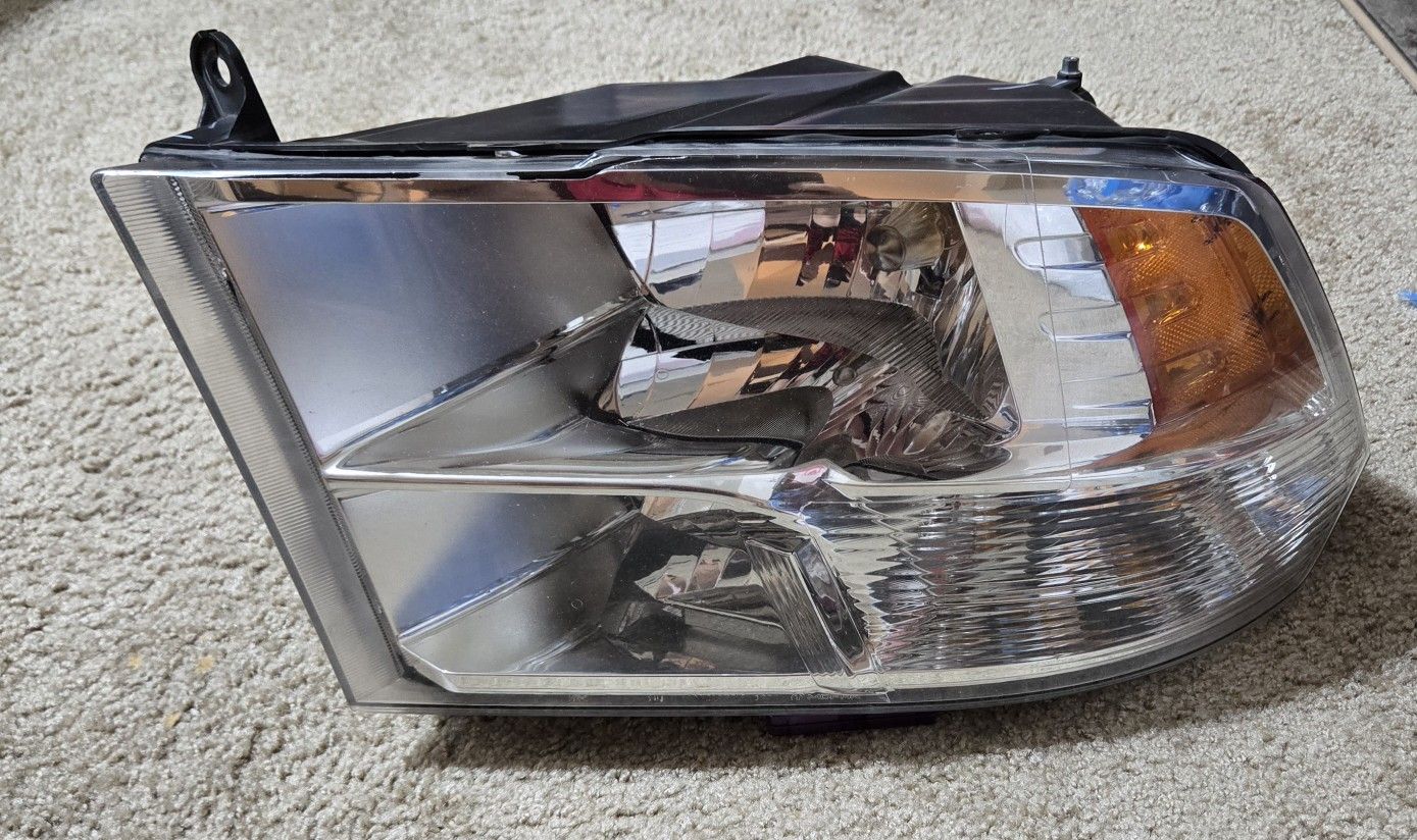 2009-2018 Dodge RAM 1500 Stock Headlight Left LH Side