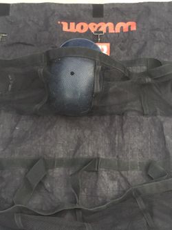 Hanging baseball helmet dugout fence caddy