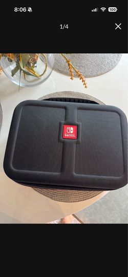 Brand New Nintendo Switch Travel Case Never used. Large hard-shell carrying case for Nintendo Switch and accessories. Perfect condition.