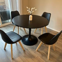 Black Tulip Table(D40.5") and 4 Black Padded Chairs