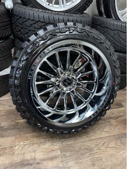 NEW 22x12 chrome hardcore wheels wrapped in 33x12.50r22 atturo mt tires