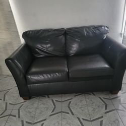 Small brown leather Sofa