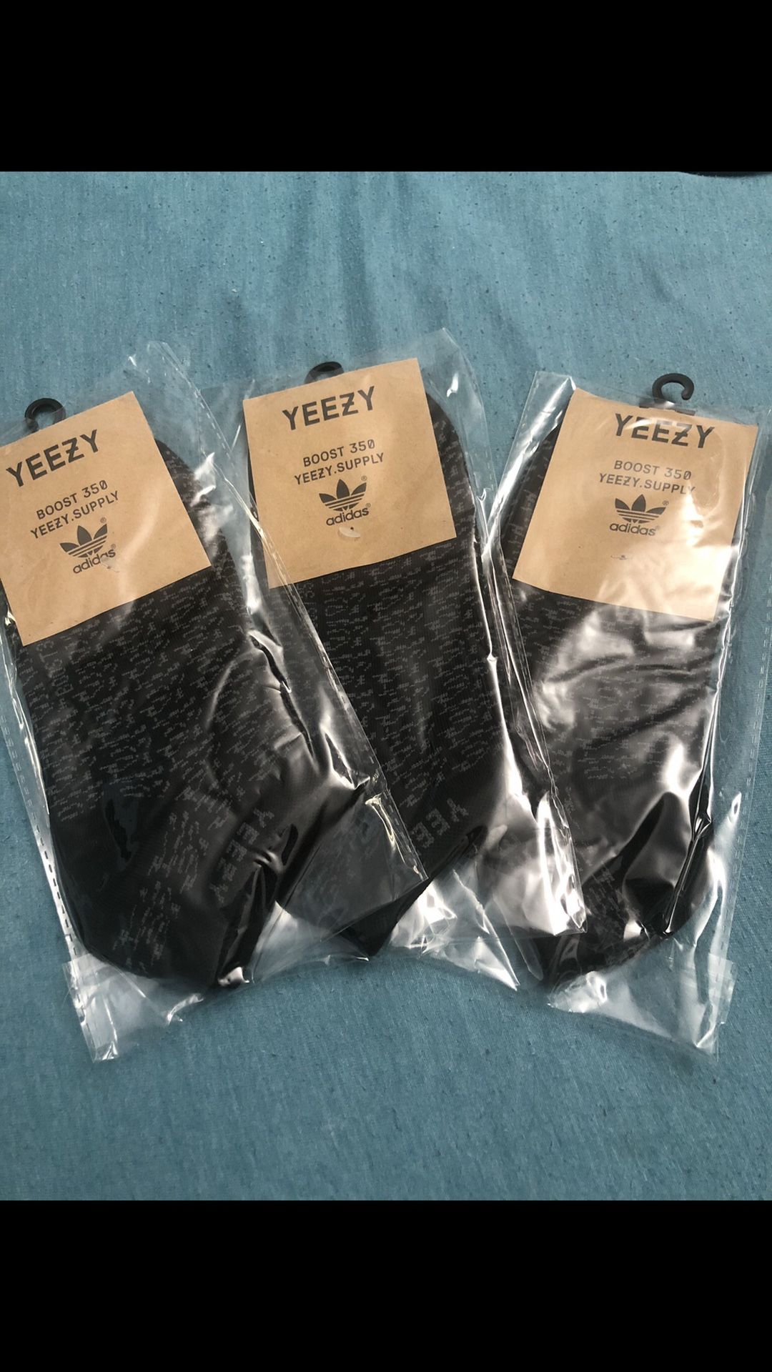 3 New Pairs Of Socks Yeezys Unisex $20. 