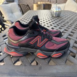 red and black new balances 9060 with orange logo and finish size 9