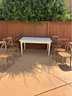 Table and 6 cross back chairs