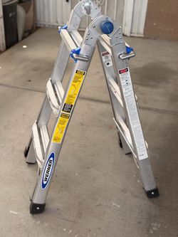 WERNER's 14 ft. Reach Height Aluminum Telescoping Multi-Position Ladder 300 Load Capacity