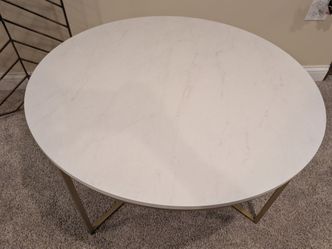 Gold and faux marble coffee table