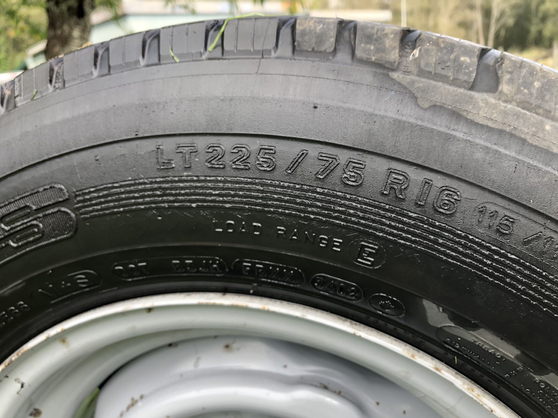 Two - 3/4 ton ford tires and rims. 265/75/16 plus other sizes and truck parts