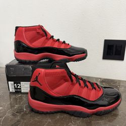 New! Unworn! Air Jordan 11 retro red and black men’s size 12