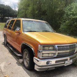 1999 Chevrolet Tahoe and a 1993 Chevy Silverado 4x4