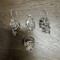 Sterling 925 pendant, earrings and ring 7 Size. 28 Grams 