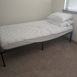 Twin Bed Frame With A Mattress