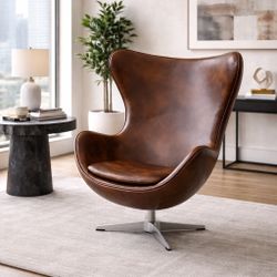 Statement egg-style swivel lounge chair 