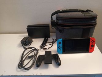 Nintendo Switch (Blue and Red) + Carry Case