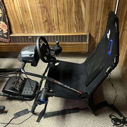 Whole sim racing setup Logitech G923 sim racing wheel, pedals, and shifter setup on next level racing gt lite play station edition sim racing cockpit