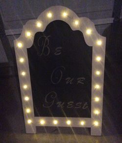 Be our guest sign