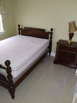 Full sized bed with frame, Matress, pringbox, and nightstand.