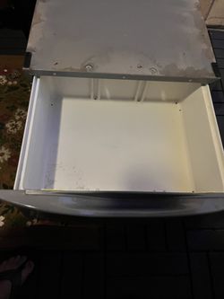 Two laundry pedestals