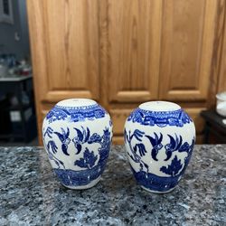 Vintage Mid Century Blue Willow pair of Salt and Pepper Shakers.  Size approximately 3 inches tall.  Preowned. 