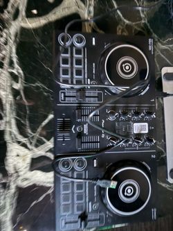 Pioneer DJ DDJ-200 is a 2-channel smart controller featuring performance pads and a portable, pro-style layout