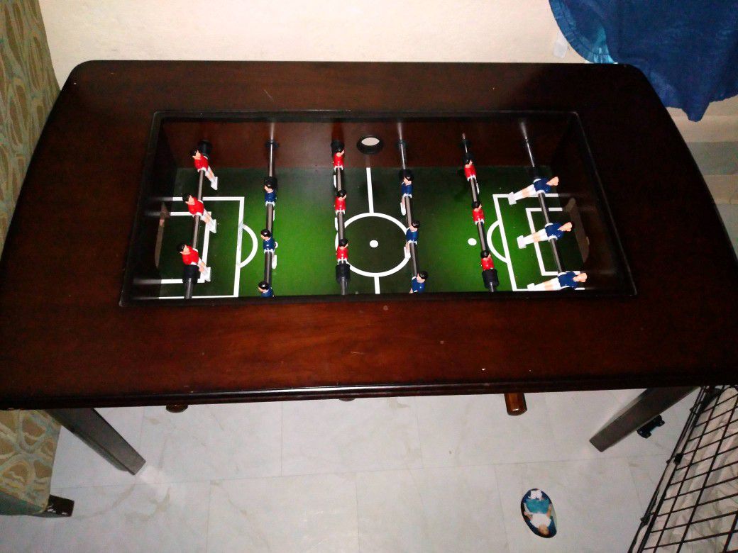 Foosball coffee table...has glass that lays across