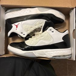 Jordan Max Aura 2 sneakers in the White/Black/Gym Red