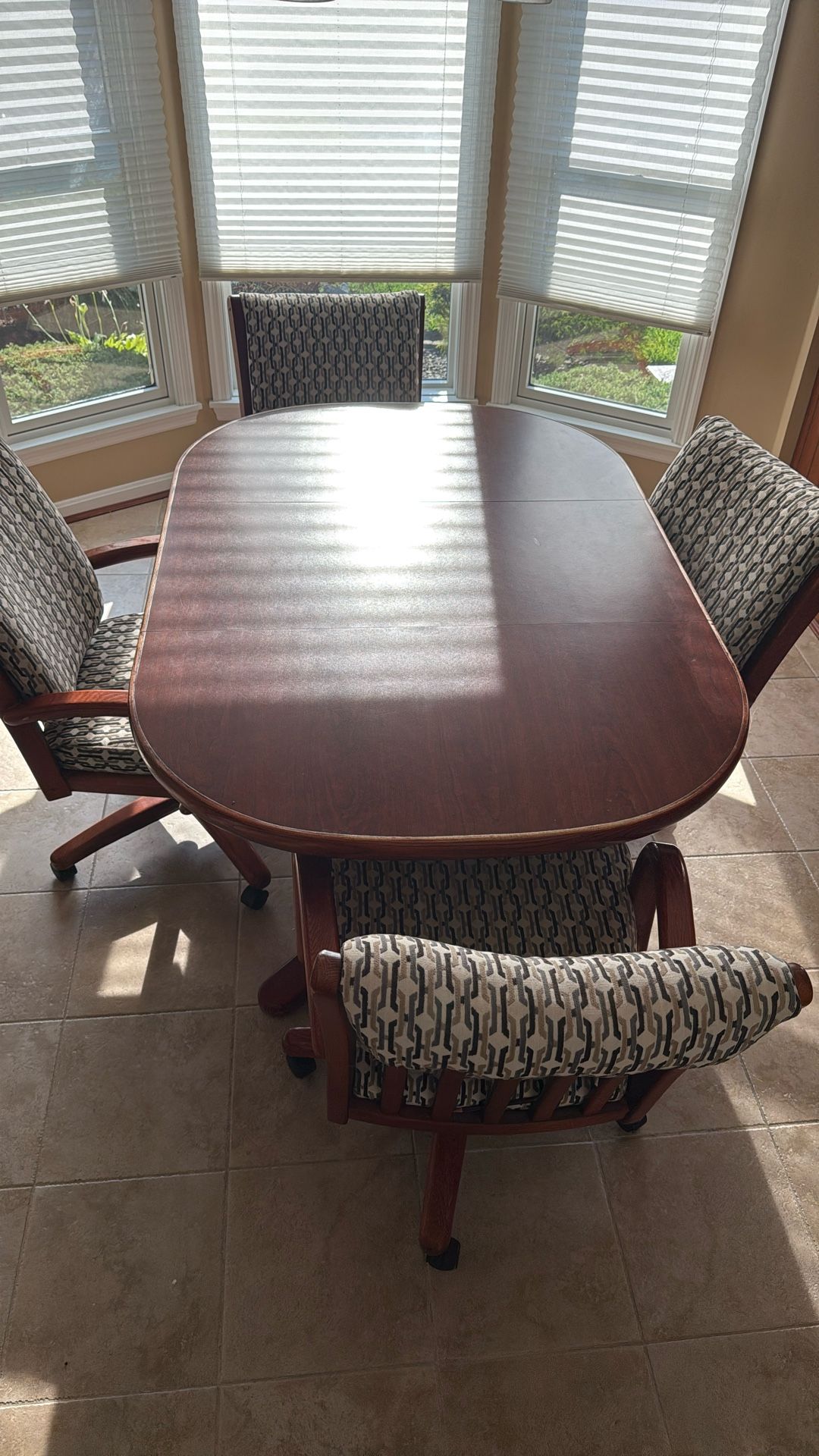 Dinette Table With Four Chairs, Roll, Swivel or Rock