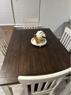 Dinning Table including 4 chairs