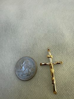 Crucifix gold pendant