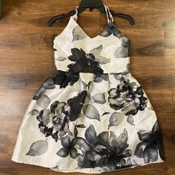 Brand New Woman’s Crystal Doll brand Black and White colored Floral Criss Cross Dress 