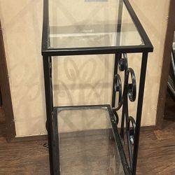 Small Side Table With Glass The Top And Bottom Area 