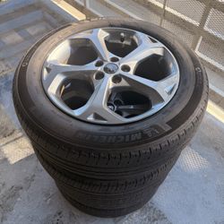 18 inch wheels 5x108 TPMS and center caps included