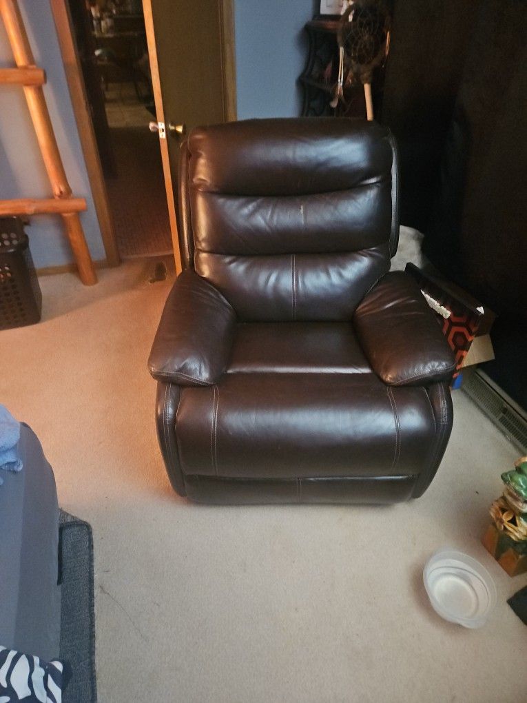 Gently Used Brown Leather Powered Recliner 