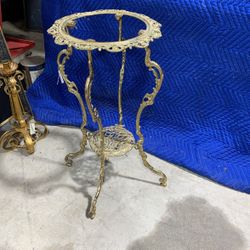 Old ornate brass stand