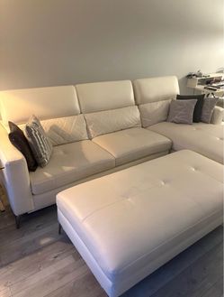 Modern Cream Leather Sectional Sofa with Matching Oversized Ottoman