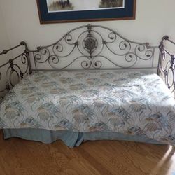 Ornamental Iron Day Bed with spring loaded rising Trundle