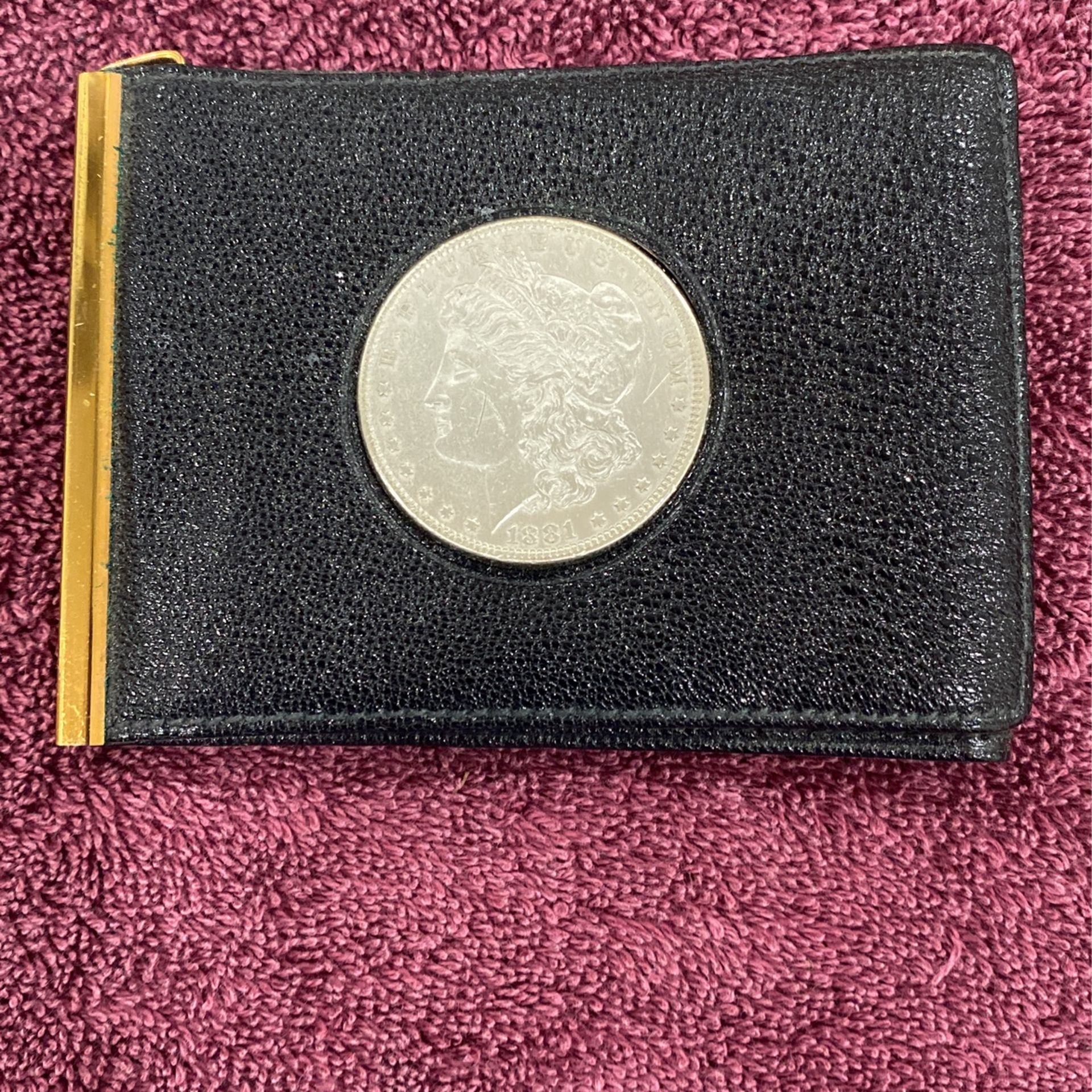 1881 Morgan Silver Dollar In A Wallet