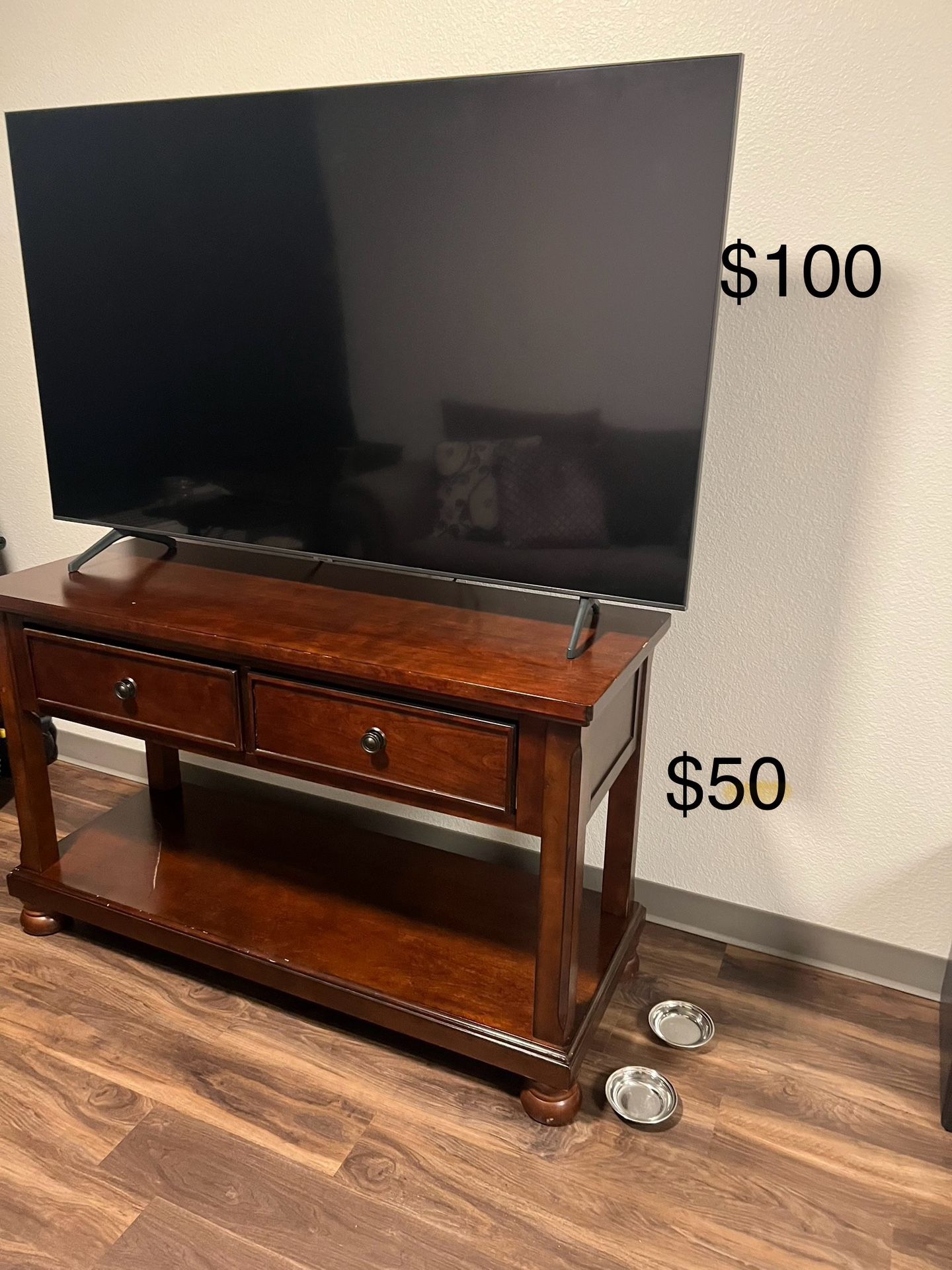 Samsung television And Wooden Tv Stand.