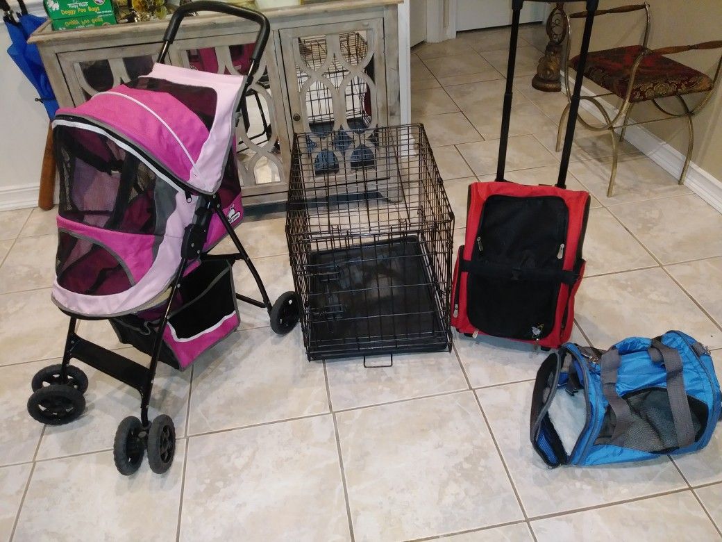 Dog stroller, Cage(17in.  w x 24in. long x  19in. tall), Dog Red Backpack carrier, Blue carrier (TAKE ALL $120)