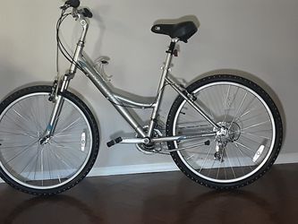 ` E W .... NISHIKI TAMABACK. ..step thru .... 26" tires m frame 17"