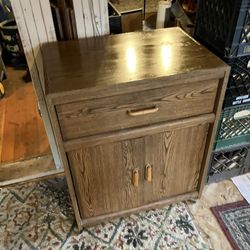 Rolling vintage-style wooden microwave cart or utility cabinet 