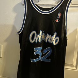 Lot - Champion brand Charles Barkley basketball jersey for the