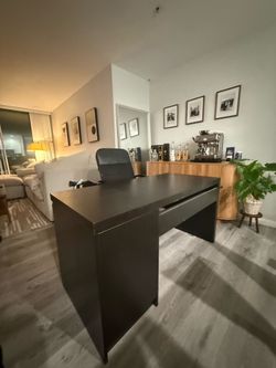 Black ikea desk with rolling chair