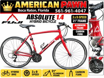 Fuji Absolute 1.4 hybrid bicycle 3x9-speed 21" aluminum frame carbon fork.