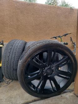 Satin black Cadillac rims