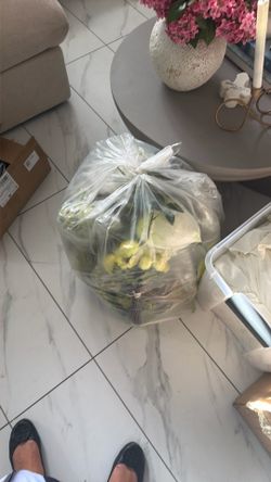 Bag filled with artificial flowers all sorts