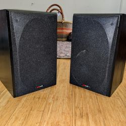 Two polk audio speakers 
