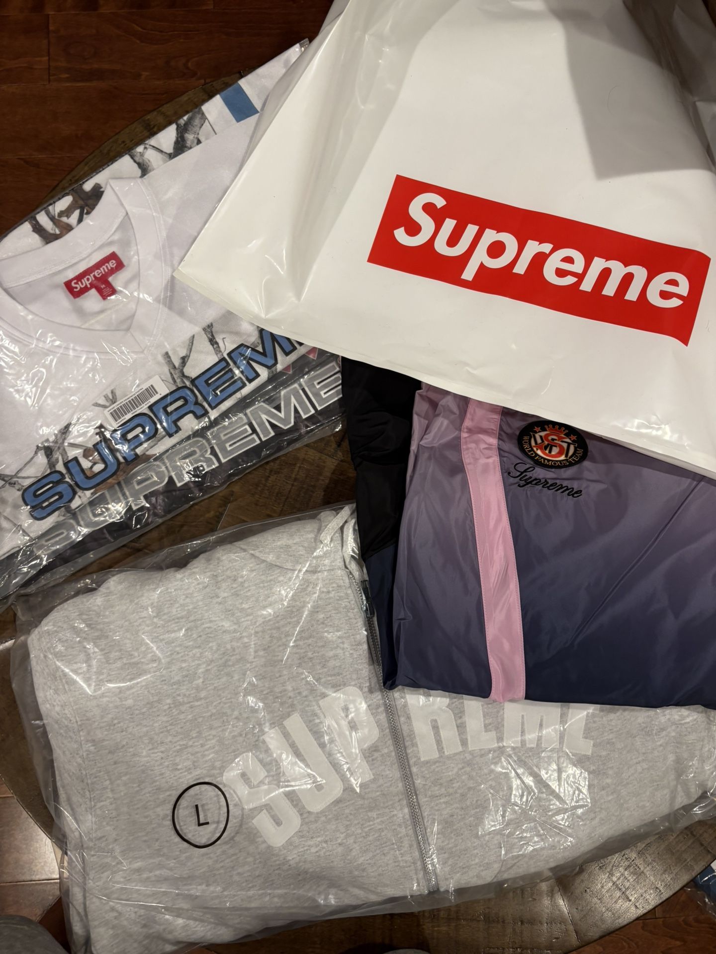 Supreme FW 25’ Week 8 Breast Cancer Awareness Football Jersey, Arc Thermal Lined Zip Up Hooded Sweatshirt, Polartec® Shearling Reversible Pullover, Su