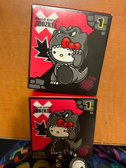 McDonalds hello kitty x Godzilla toy