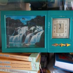 Wall clock with waterfall